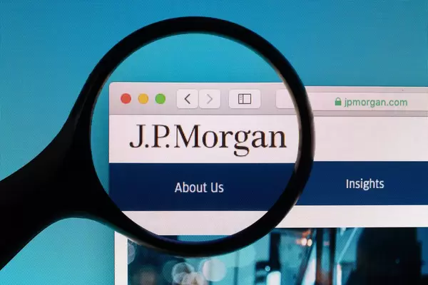 J.P. Morgan logo under magnifying glass