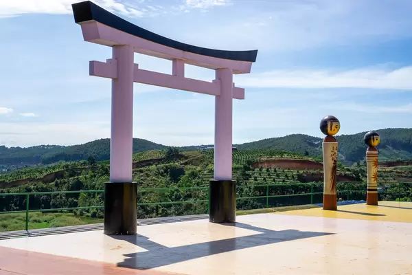 Japanese Torii Gate next to two Japanese Characters Characters on a Terrace of Me Linh Cafe in Da Lat, Vietnam