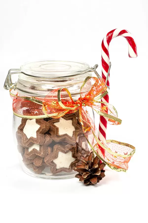 Jar of star cookies, lollipop cane and pine cone