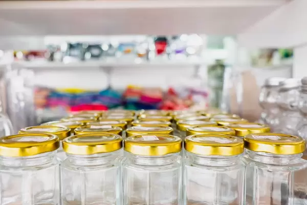 Jars with lids on display at a local store