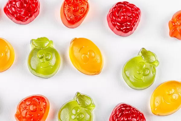 Jelly candies in the shape of fruit. The view from the top (Flip 2020)