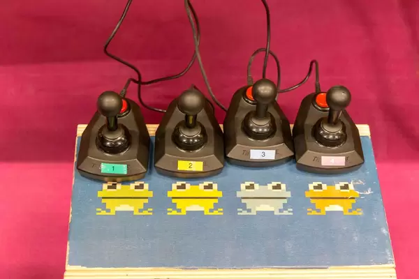 Joysticks connected to a retro gaming console