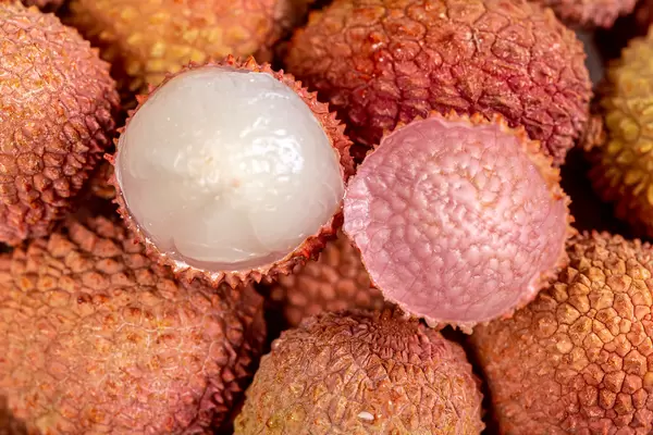 Juicy fresh lychees fruits background