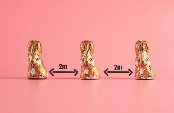 Keep your distance concept with chocolate easter bunnies