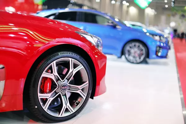Kia cars, close-up view of wheels, auto show