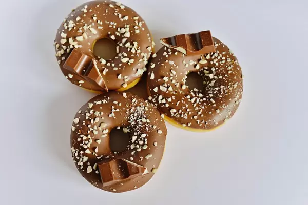 Kinder chocolate tasting fresh Donuts