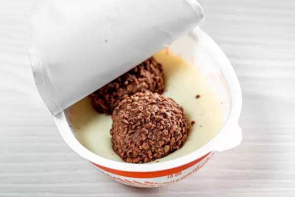 Kinder joy opens with children's sweets inside (Flip 2019)