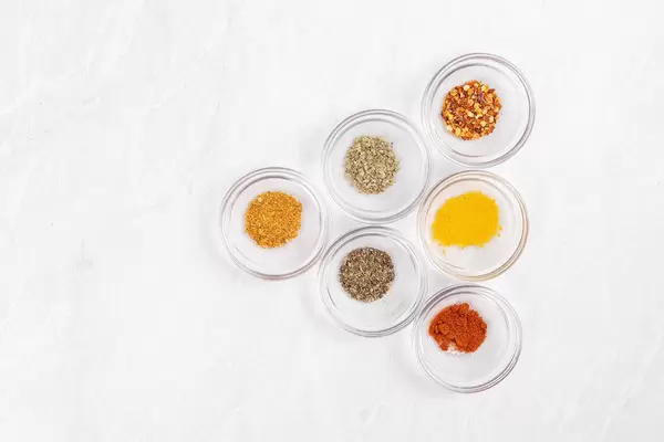 Kitchen Spices in the glass bowls top view