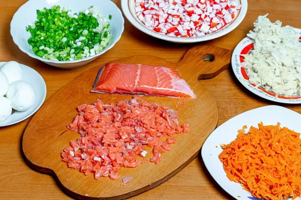 Kitchen table with salad ingredients (Flip 2020)