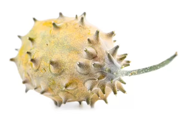 Kiwano, horned melon on white background