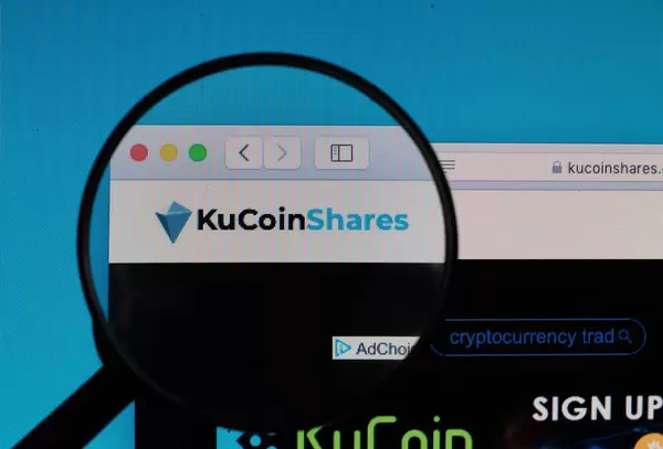 KuCoinShares logo under magnifying glass