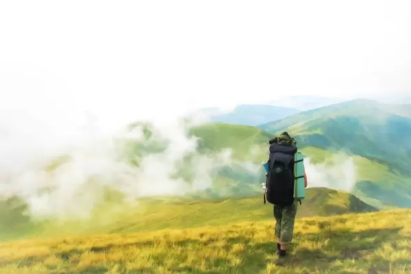 Landscape Nature Photo of Woman Trekking in the Mountains