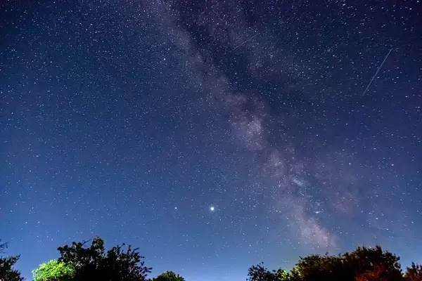 Landscape with Milky Way. Night sky with stars at summer