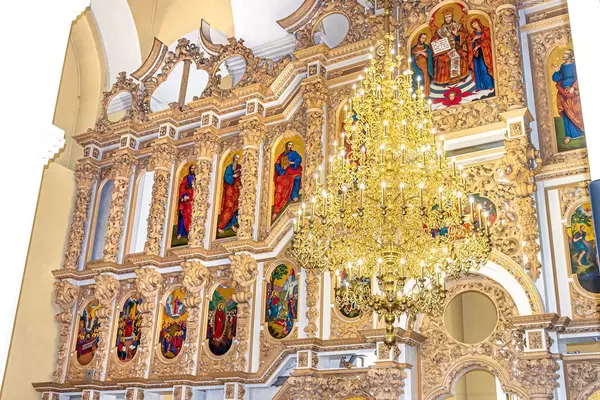 Large chandelier in the Church on the background of Christian icons (Flip 2019)