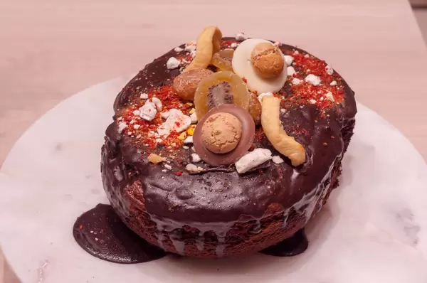 Large chocolate cake with dried fruit