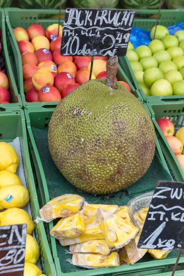 Large jackfruit at a fruit stand at Naschmarkt in Vienna