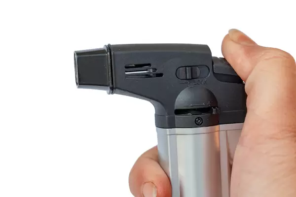 Large lighter in a woman's hand
