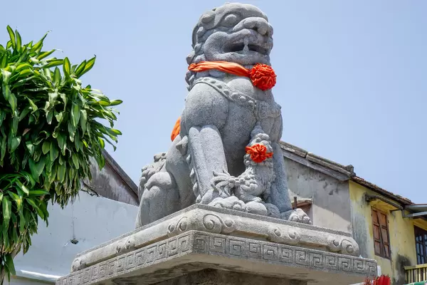 Large Stone Statue of a Chinese Guardian Lion at the Assembly Hall of Fujian Chinese and Phuc Kien Pagoda in Hoi An, Vietnam
