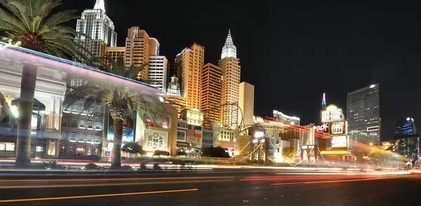 Las Vegas skyline with light trails and palms