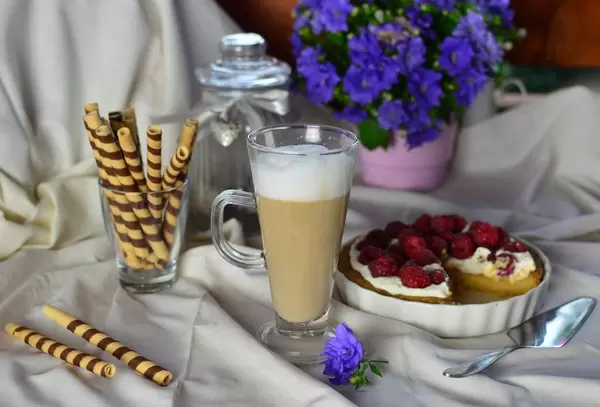 Latte coffee and tart with fruit