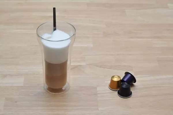 Latte macchiato from a Nespresso machine in a glass