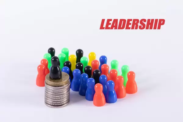 Leadership concept with pawn figures