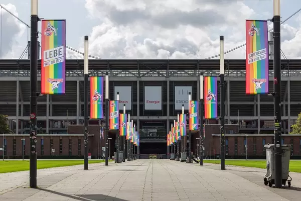 Lebe wie du bist: football team 1. FC Köln celebrates gay rights with rainbow flags in front of Rhein-Energie Stadion in Cologne, Germany
