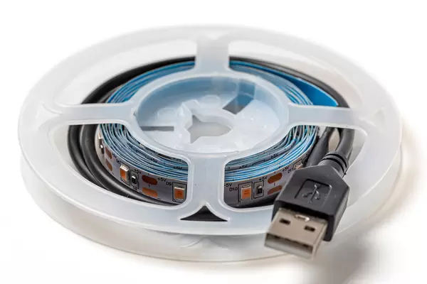 Led strip with connection cable on roll on white