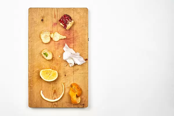 Leftover fruit pieces on the cutting board