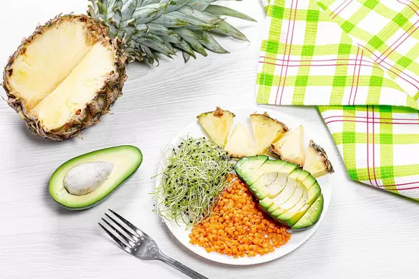 Lentils with micro greens, avocado and pineapple