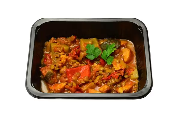 Lentils with vegetables in tomato sauce