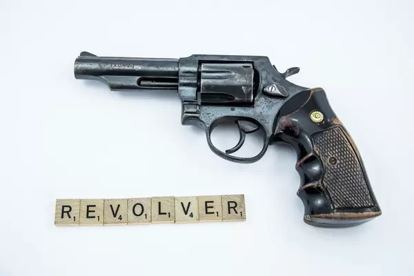 Letters reading REVOLVER