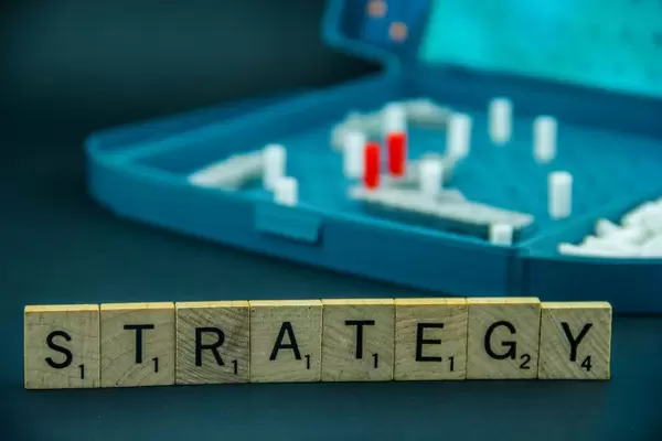 Letters Spelling Strategy in Front of the Game Battleship