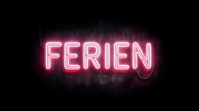 Leuchtender Ferientext in Neonschrift