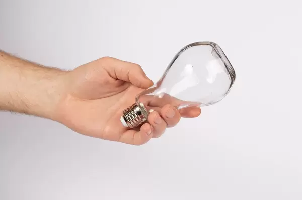 Light bulb in hand