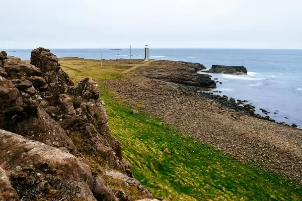 Lighthouse on the coast / Leuchtturm an der Küste