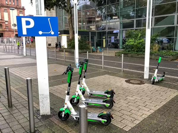 Lime E-Scooter in the designated parking area