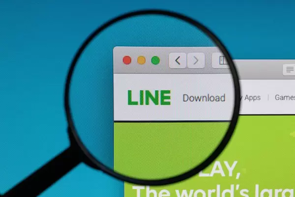 LINE logo under magnifying glass