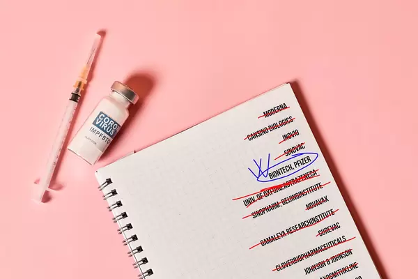 List of coronavirus vaccine manufacturers crossed out and marked Pfizer-BioNtech vaccine