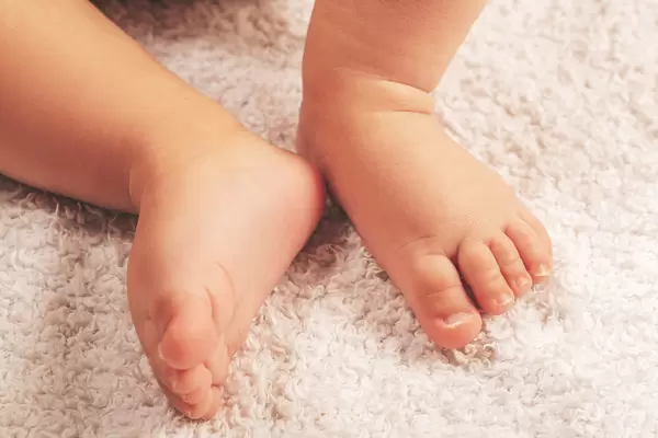 Little bare feet of a child, close-up