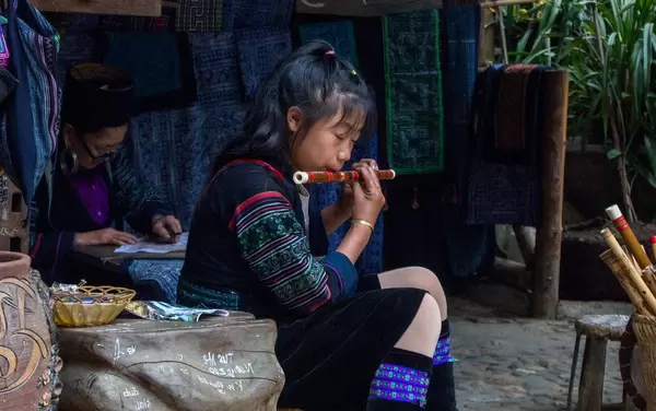 Little in Traditional Clothes playing flute  (Flip 2019)