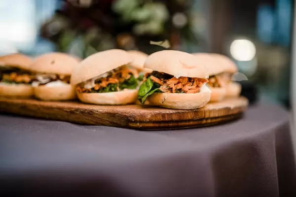 Little Pork Burgers On Wooden Plates