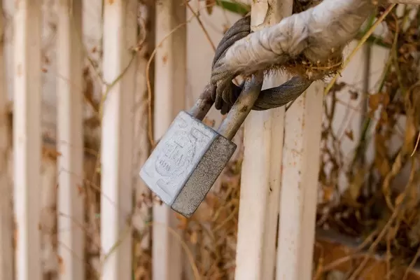 Lock on fence in sunlight