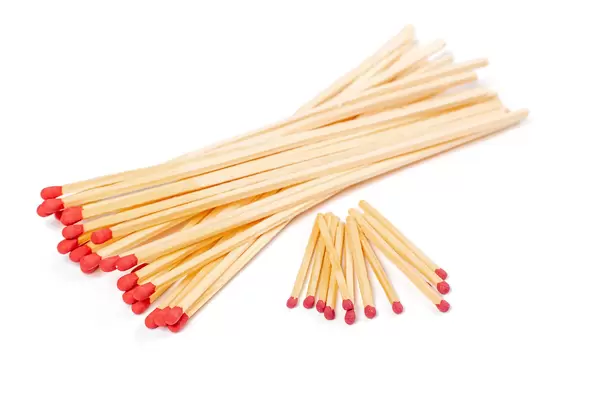 Long fireplace and short matches on white