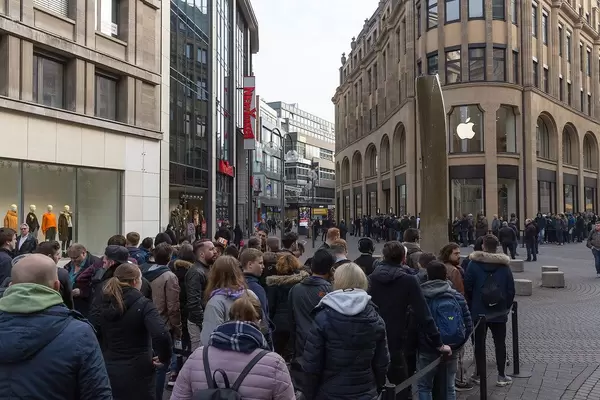 Long Line in front of Apple Store for Release of new iPhone in Cologne, Germany
