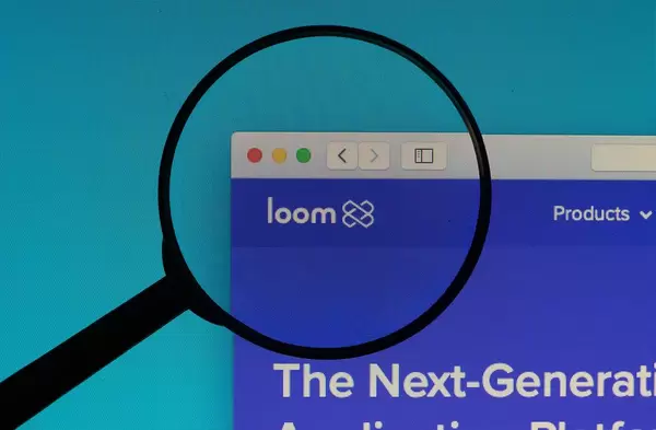 Loom logo under magnifying glass