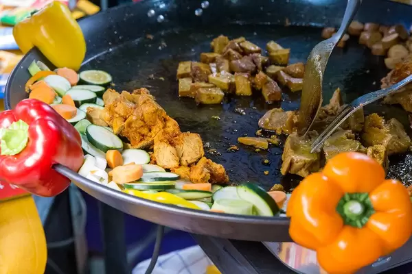 Lord of Tofu - Tofu Barbecue in a big pan for tasting at the Veggieworld 2019 in Cologne