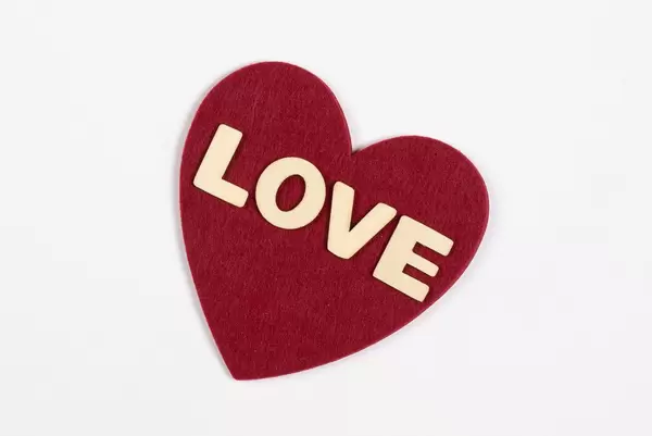 Love text on a red heart