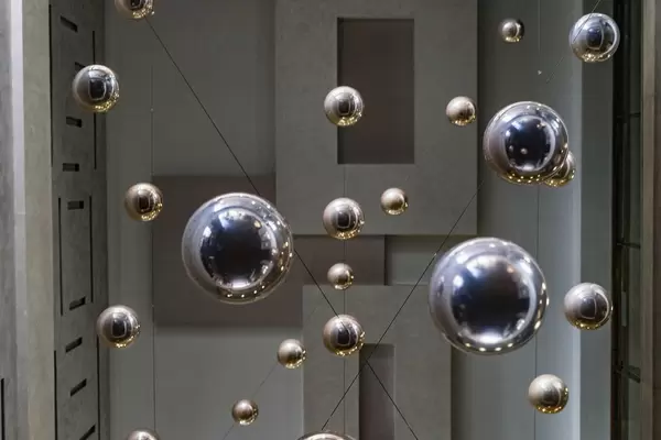 Low Angle View of the Silver Metal Shiny Balls Hanging from The Ceiling