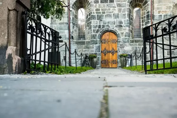 Low view of wooden church door